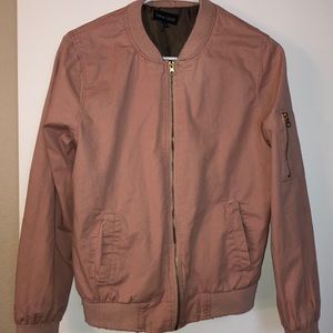 Blush pink bomber-style jacket